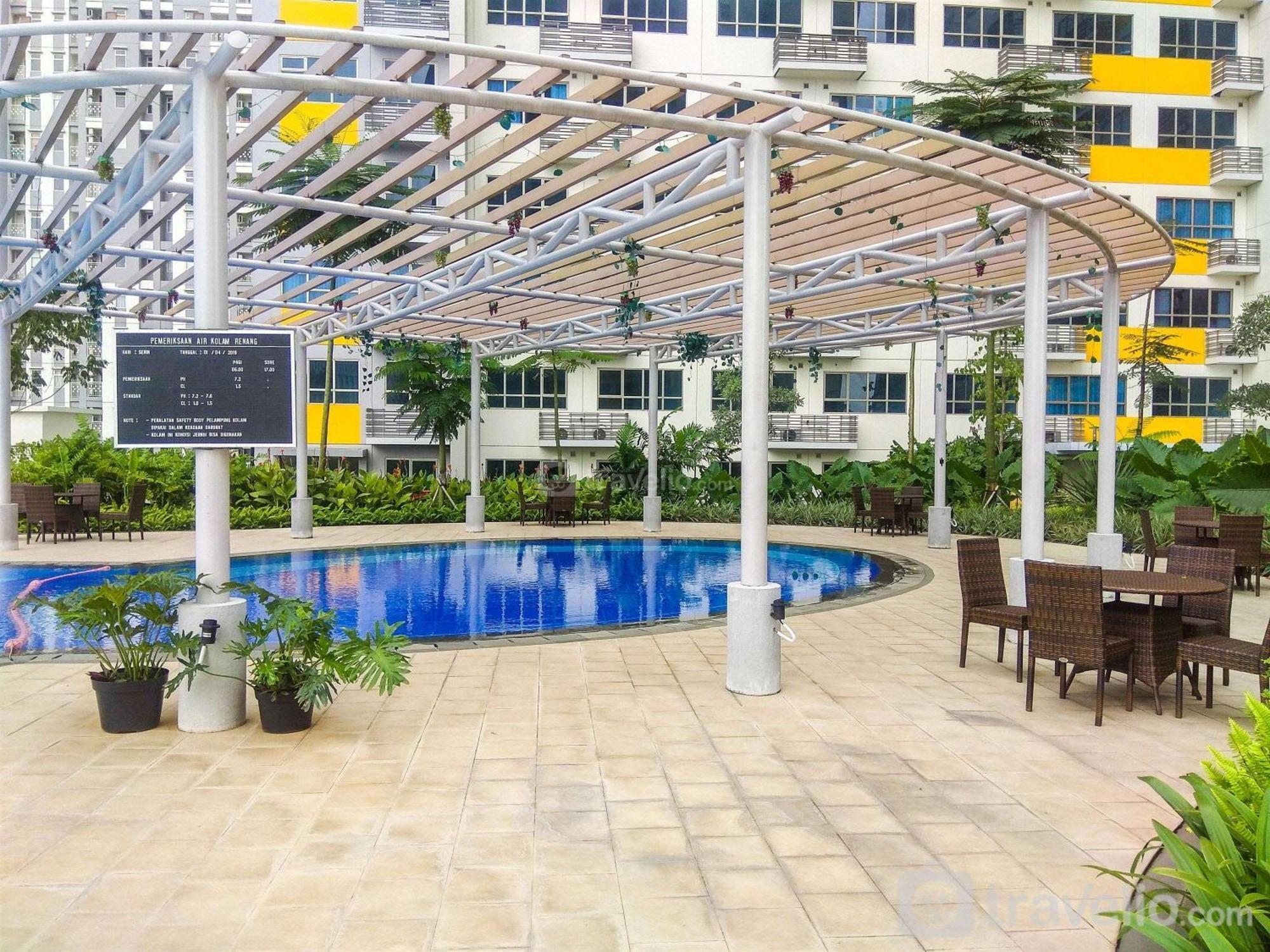 With Garden View At The Springlake View Summarecon By Travelio Apartemen *